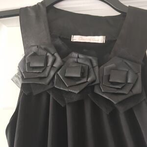 Charlotte Russe Black Sleeveless Shift Dress with Rosette Neckline